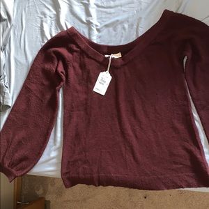 New with tags. Off the shoulder sweater.